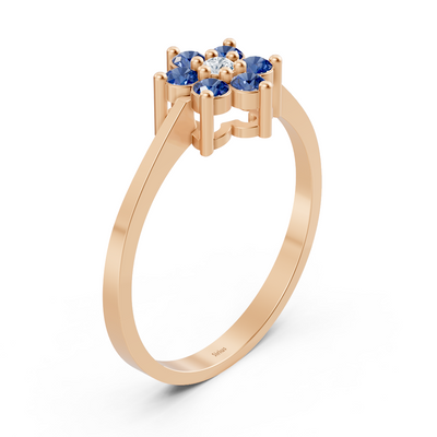 Elegant rose gold ring with sapphires and diamonds
