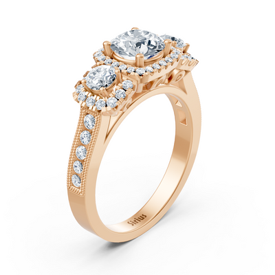Rose gold halo three-stone diamond ring