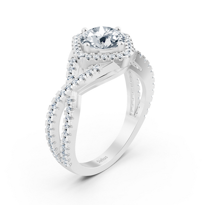Diamond halo engagement ring in white gold