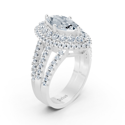Weißgoldener Halo-Ring mit Marquise-Diamant & Rubinen